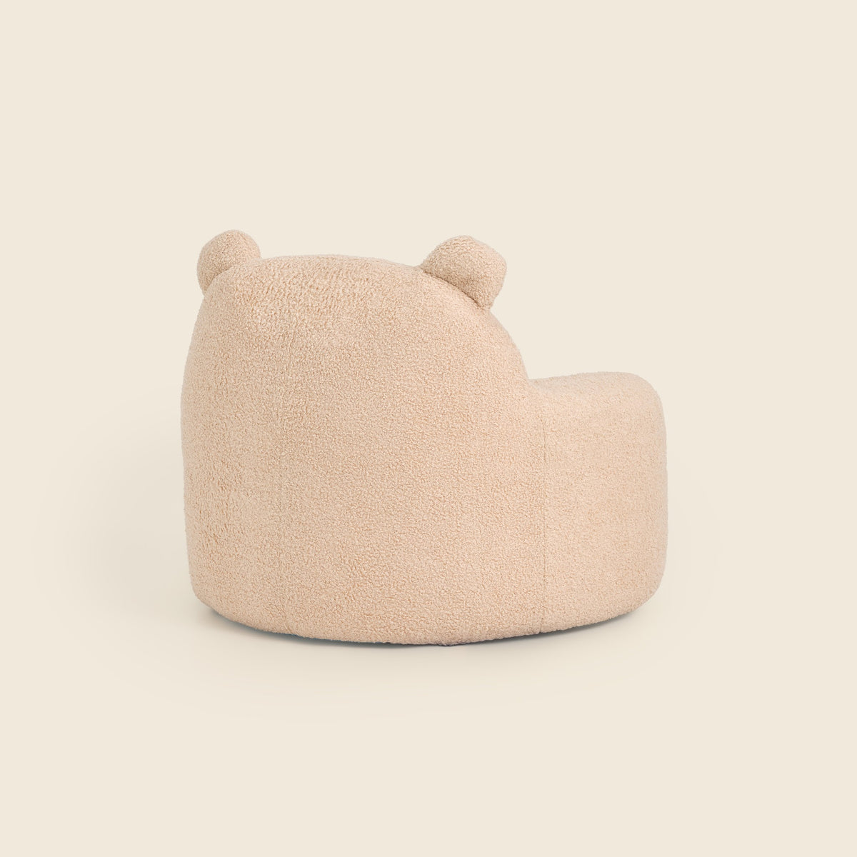 Back view of the cream Teddi Kids Armchair showing the ears 