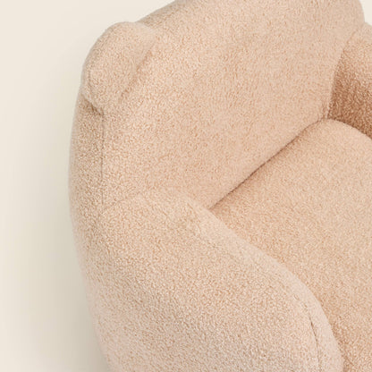 Close-up of the cream Teddi Kids Armchair seat, arm and ears 
