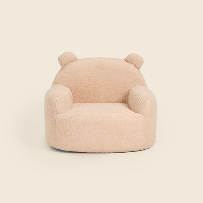 Cream Teddi Kids Armchair with teddy bear ears, front view on a beige background 